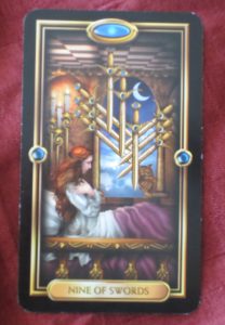 gilded tarot nine of swords